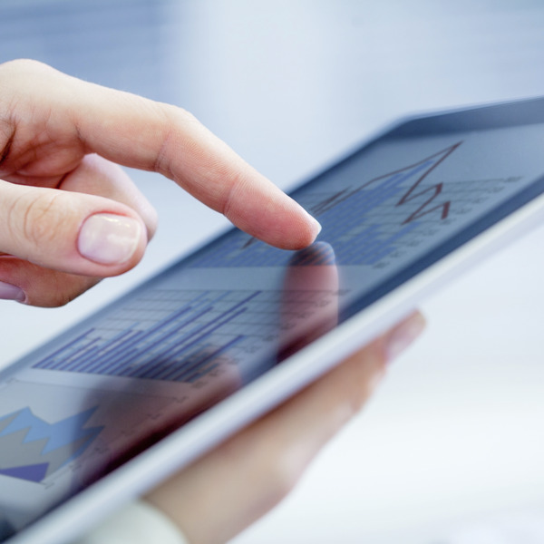 finger tapping on the touchscreen of a tablet finger tapping on the touchscreen of a tablet
